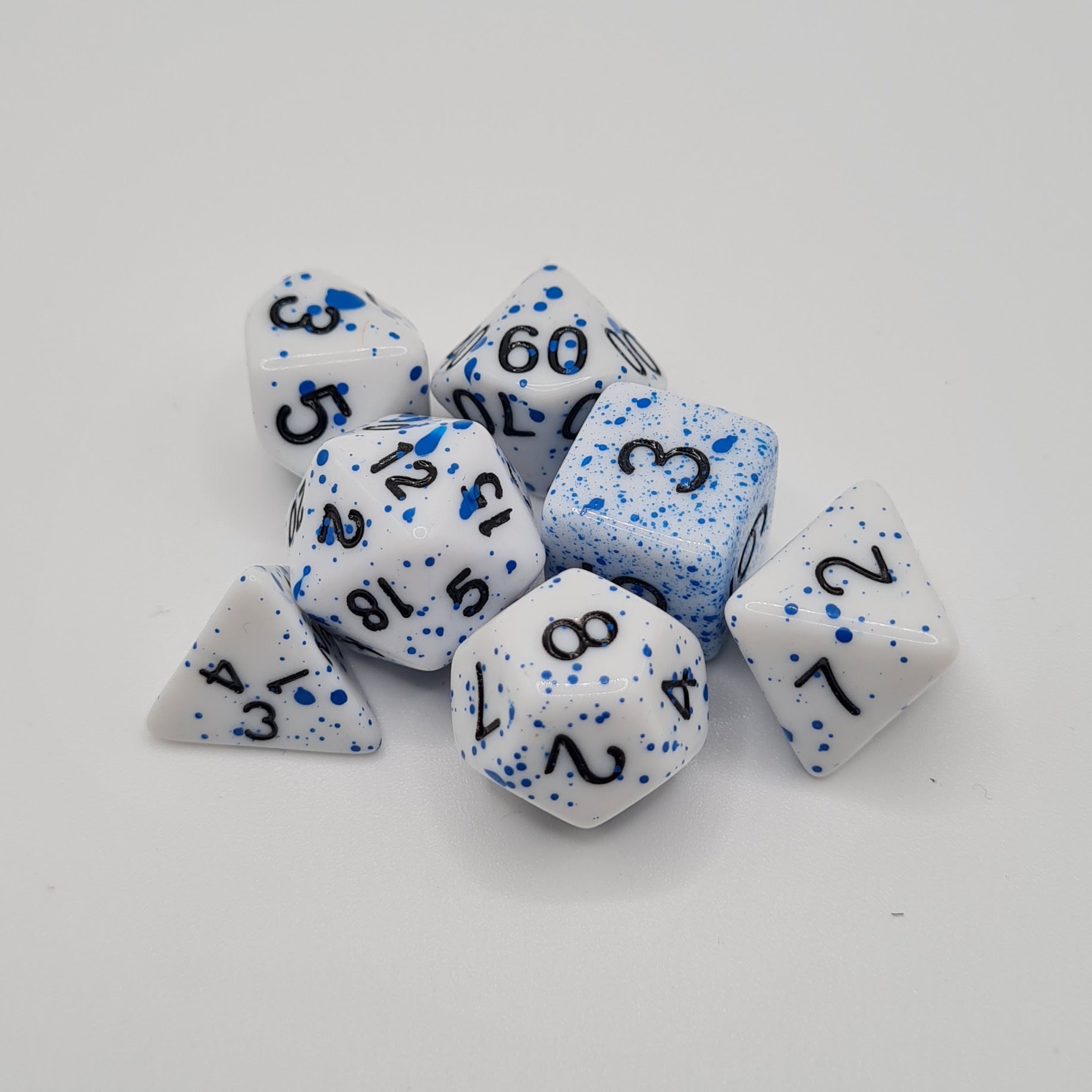Blue Speckled Polyhedral Dice Set – 7-Piece Tabletop Gaming Dice with Bag