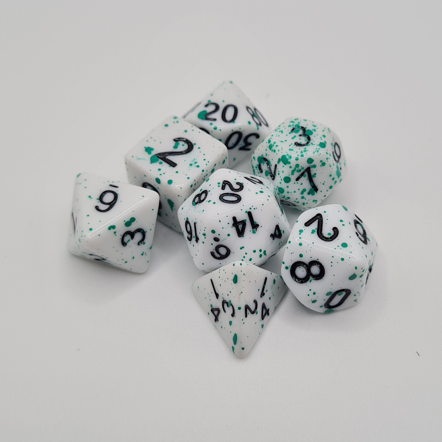 Green Speckled Polyhedral Dice Set – 7-Piece Tabletop Gaming Dice with Bag