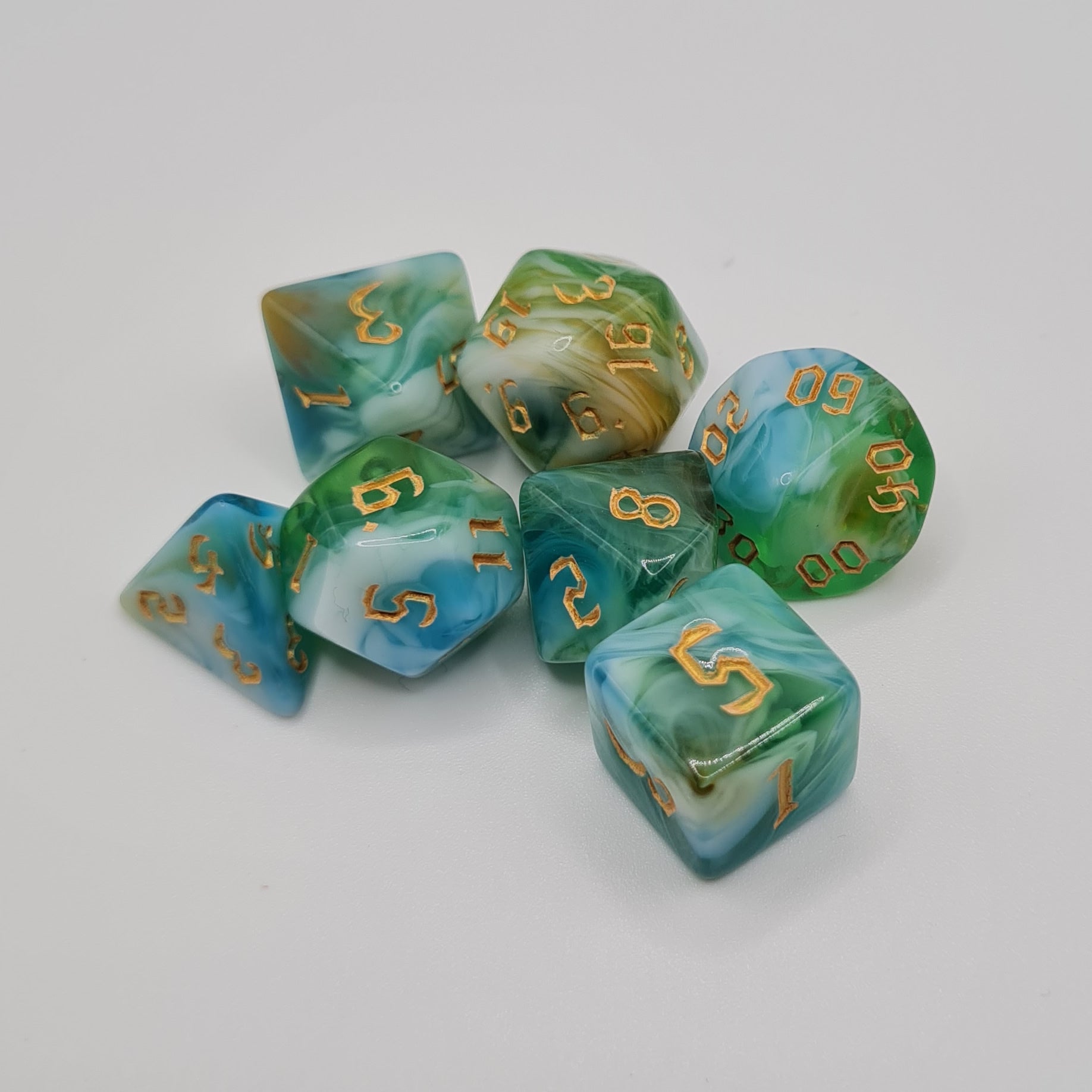 Green and Blue Clouded Polyhedral Dice Set – 7-Piece Tabletop Gaming Dice with Bag