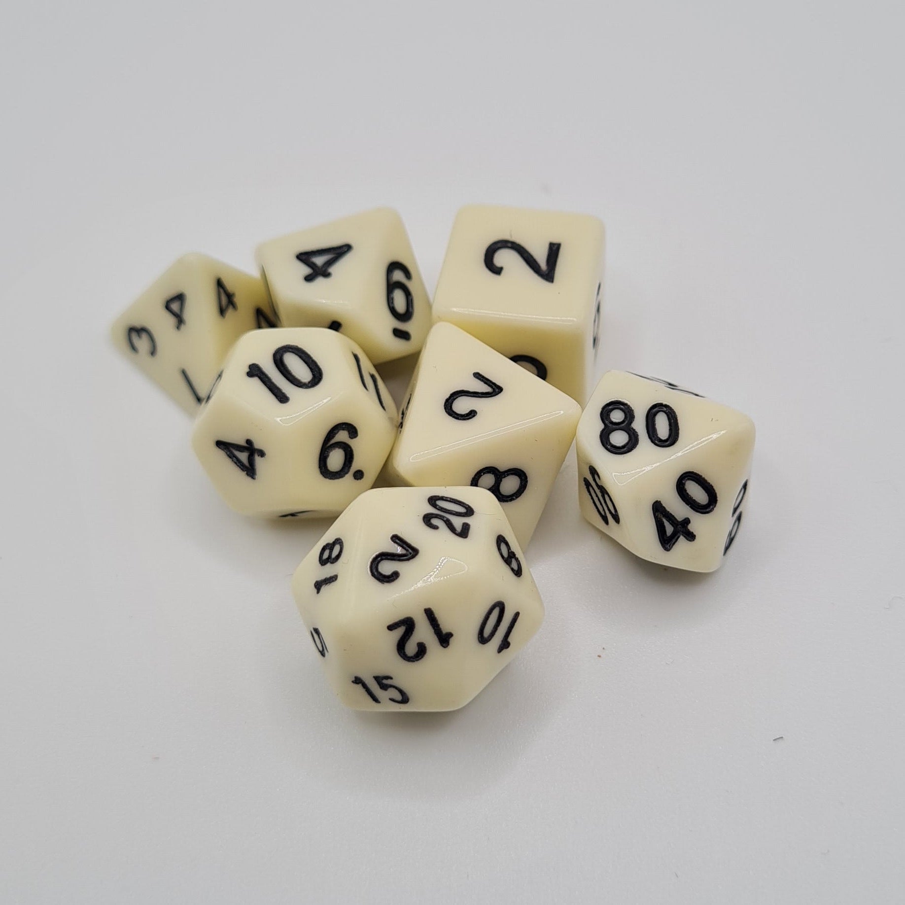 Ivory Polyhedral Dice Set – 7-Piece Tabletop Gaming Dice with Bag