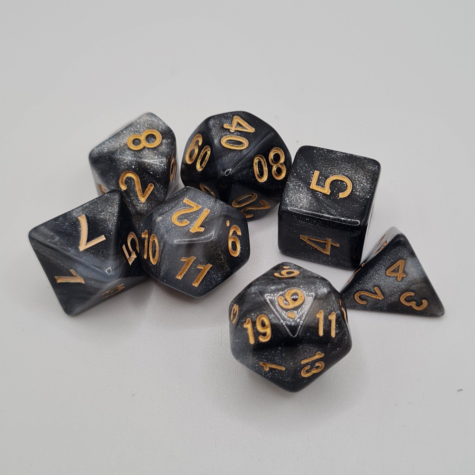 Black and Silver Glitter Polyhedral Dice Set – 7-Piece Tabletop Gaming Dice with Bag