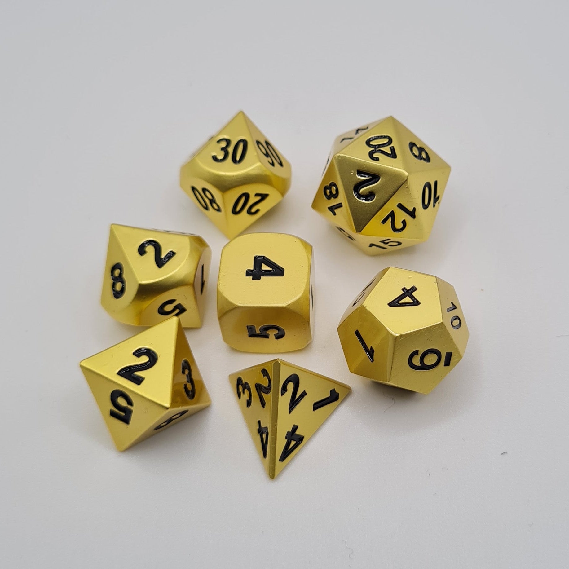Gold Finish Metal Polyhedral Dice Set – 7-Piece Tabletop Gaming Dice with Bag