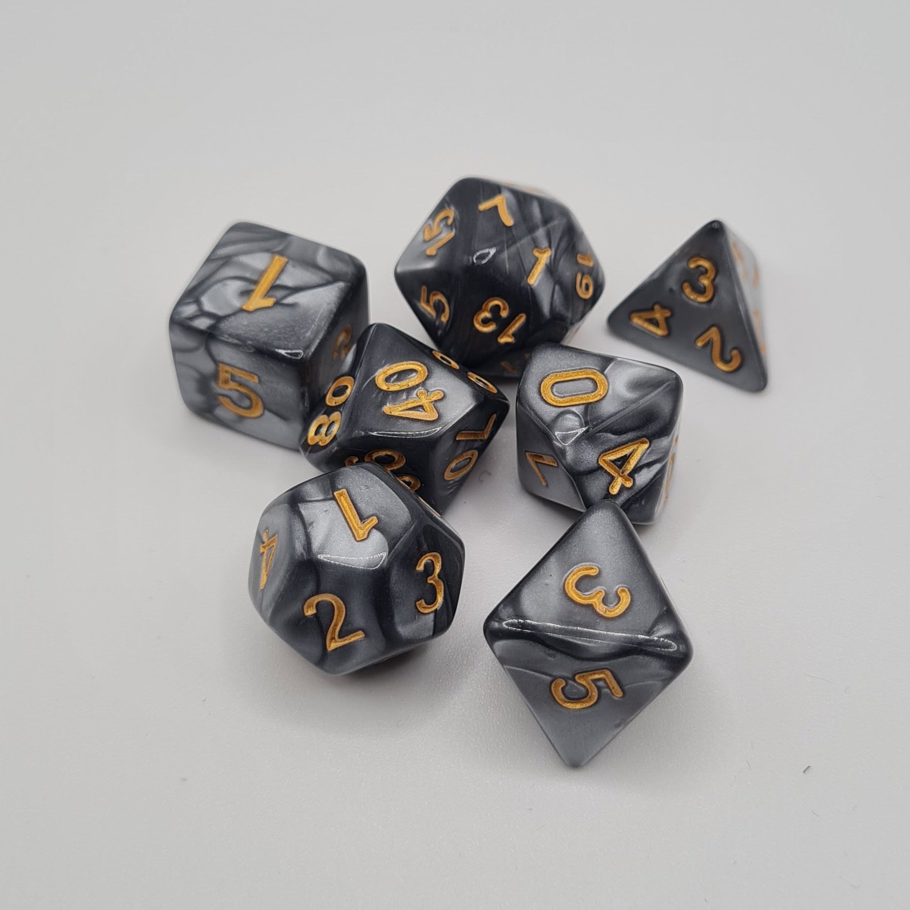 Black and Silver Swirls Polyhedral Dice Set – 7-Piece Tabletop Gaming Dice with Bag