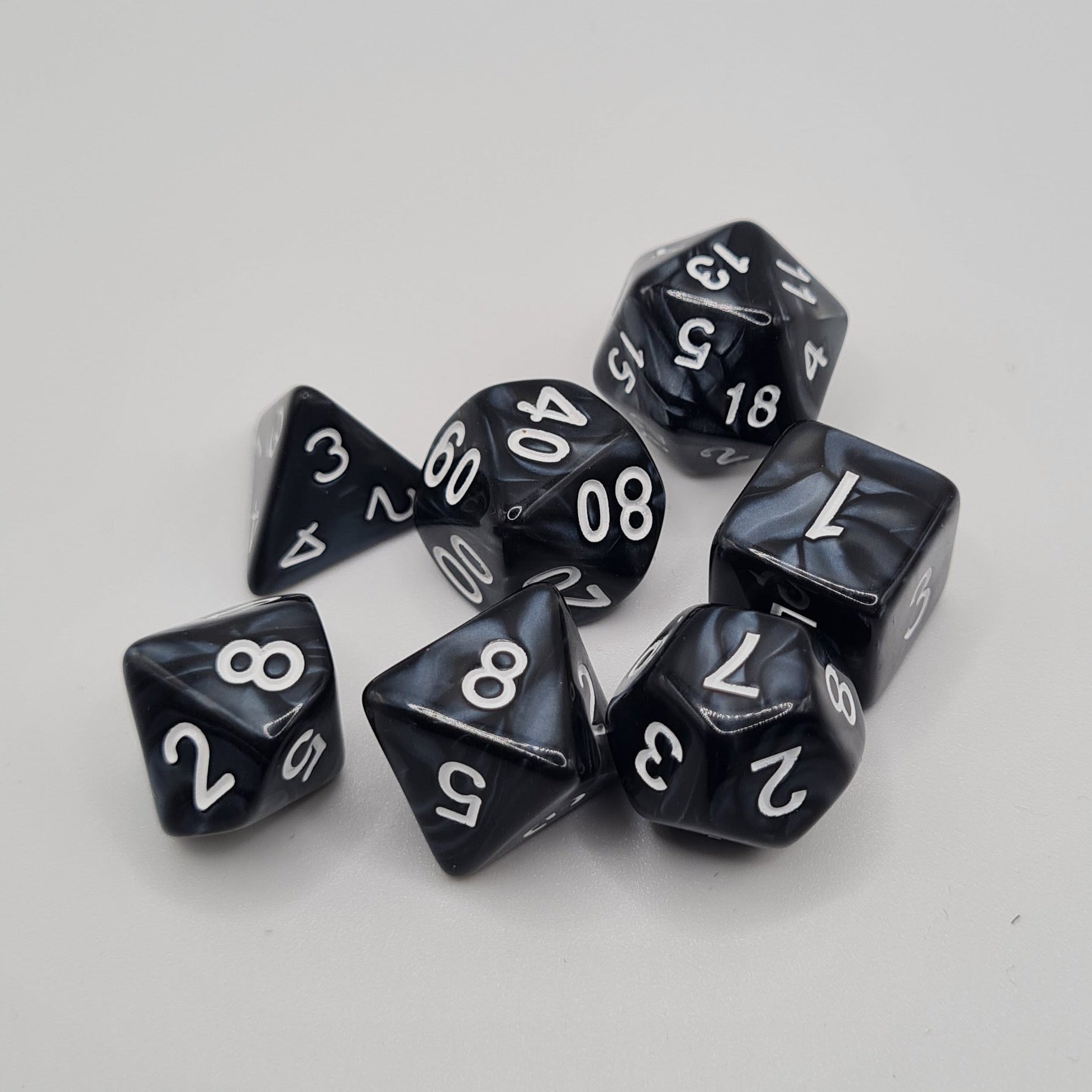 Black and Grey Swirls Polyhedral Dice Set – 7-Piece Tabletop Gaming Dice with Bag