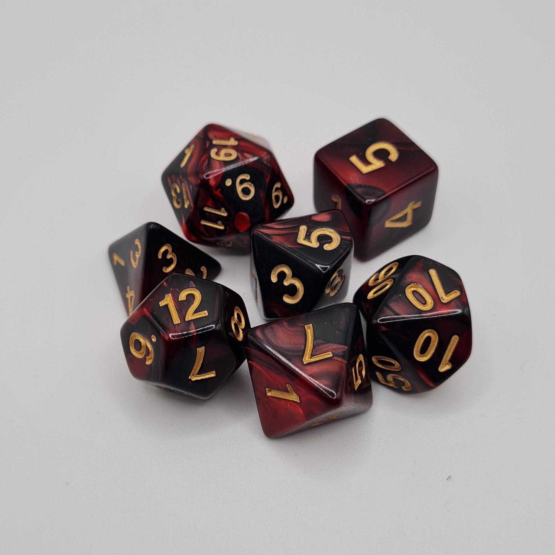 Burgundy Swirls Polyhedral Dice Set – 7-Piece Tabletop Gaming Dice with Bag