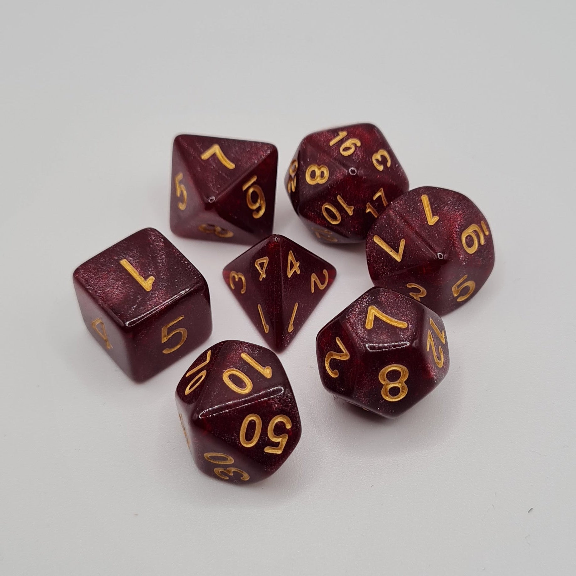 Red Wine Glitter Polyhedral Dice Set – 7-Piece Tabletop Gaming Dice with Bag