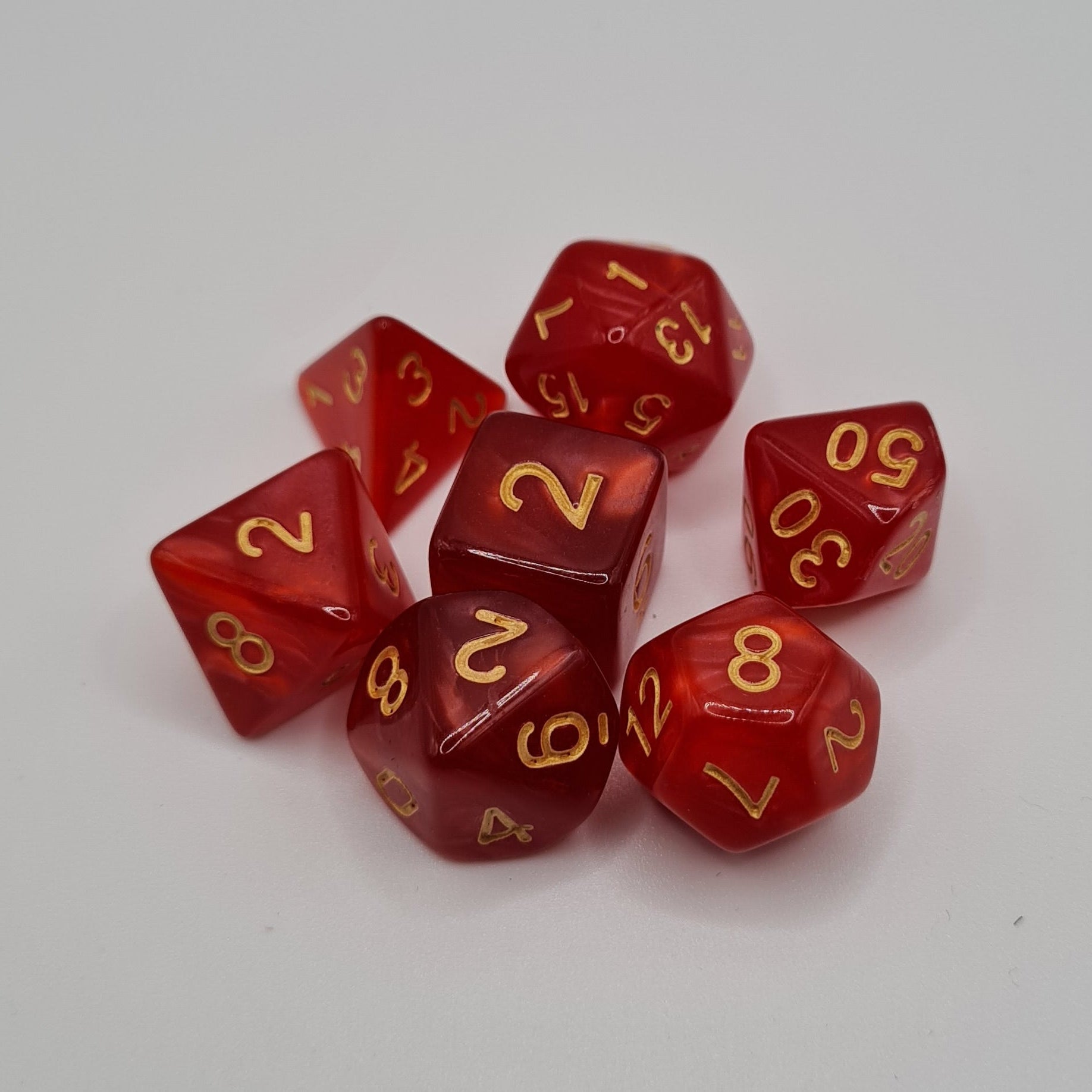 Red Swirl Polyhedral Dice Set – 7-Piece Tabletop Gaming Dice with Bag