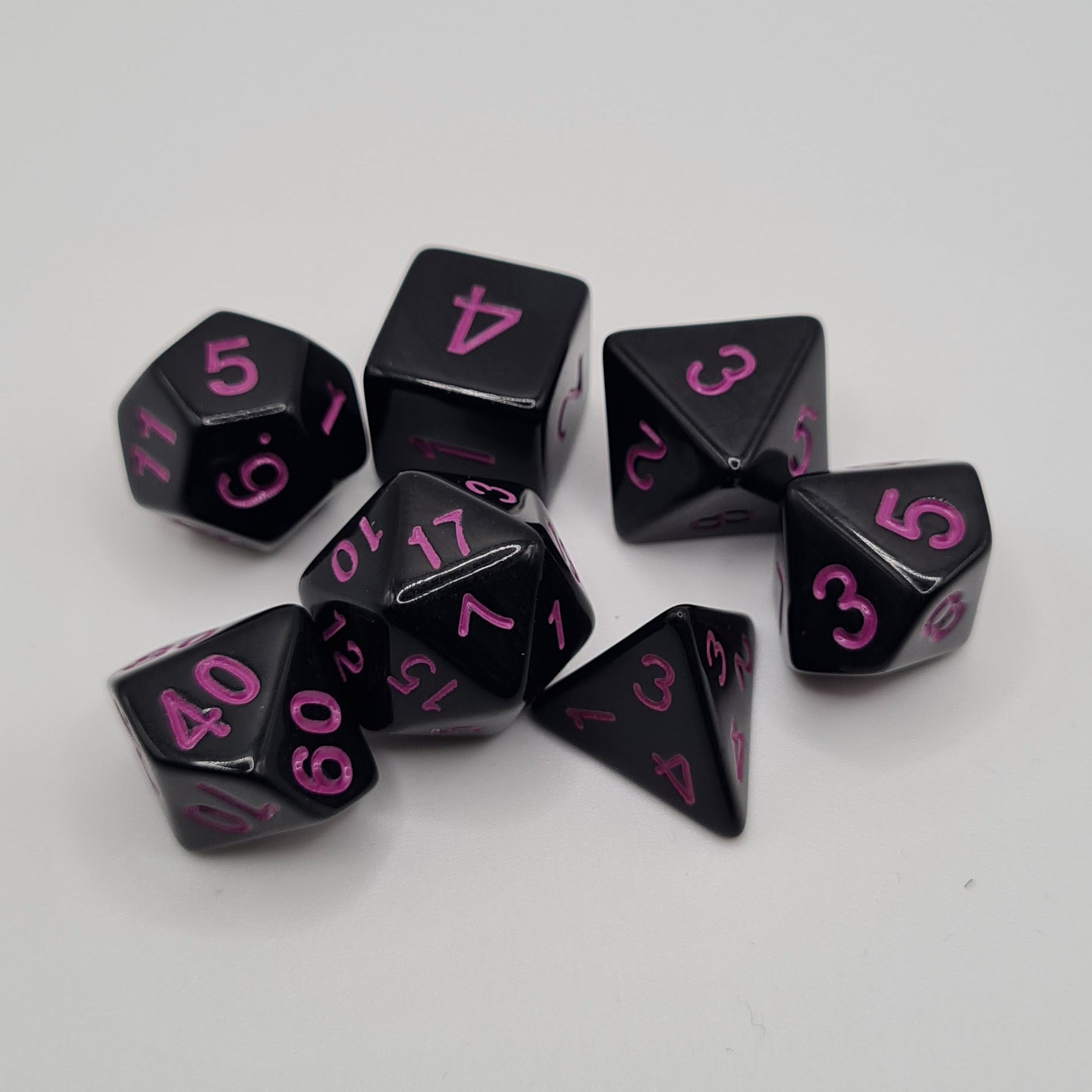 Black with Purple Numbers Polyhedral Dice Set – 7-Piece Tabletop Gaming Dice with Bag