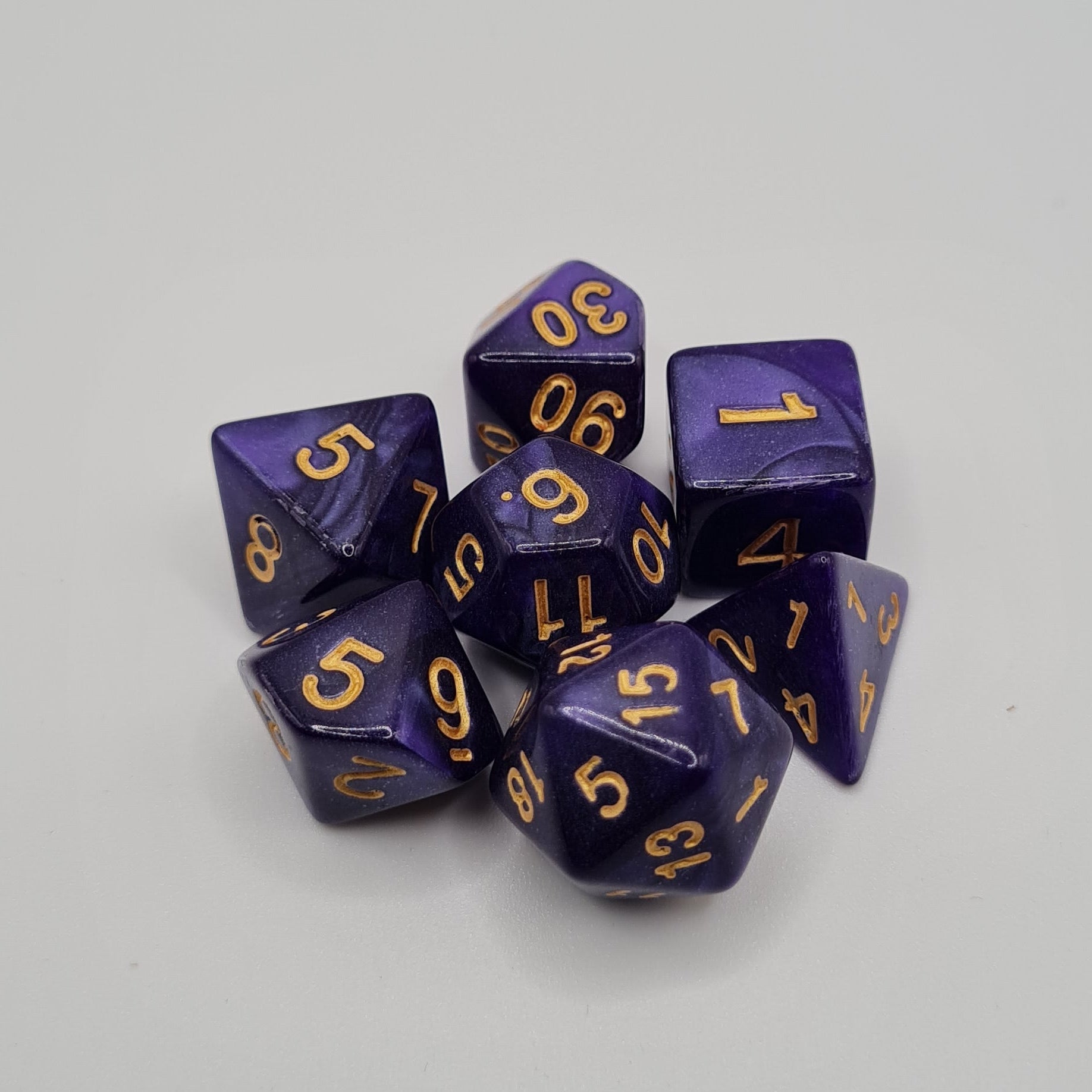Purple Swirls Polyhedral Dice Set – 7-Piece Tabletop Gaming Dice with Bag