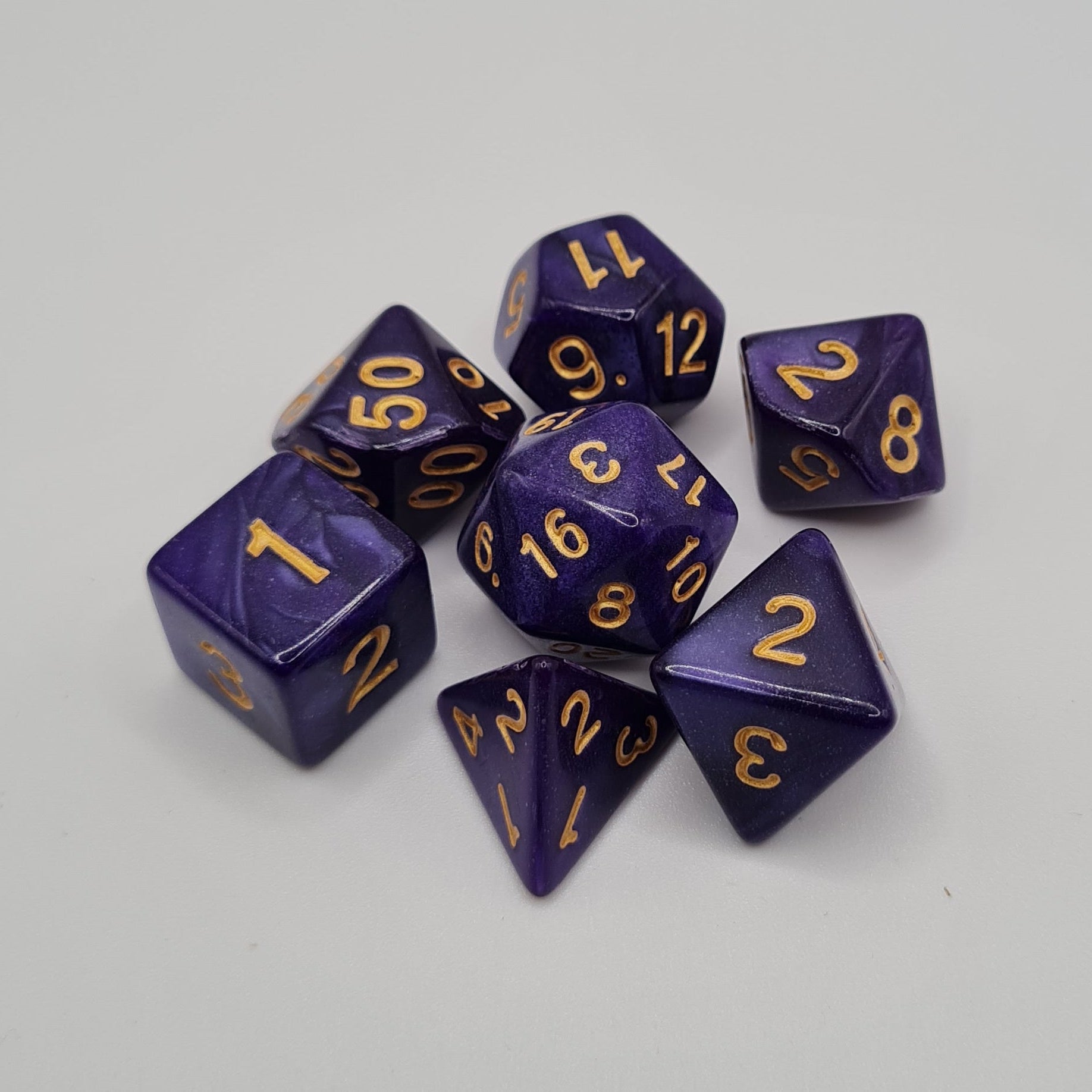 Purple Swirls Polyhedral Dice Set – 7-Piece Tabletop Gaming Dice with Bag