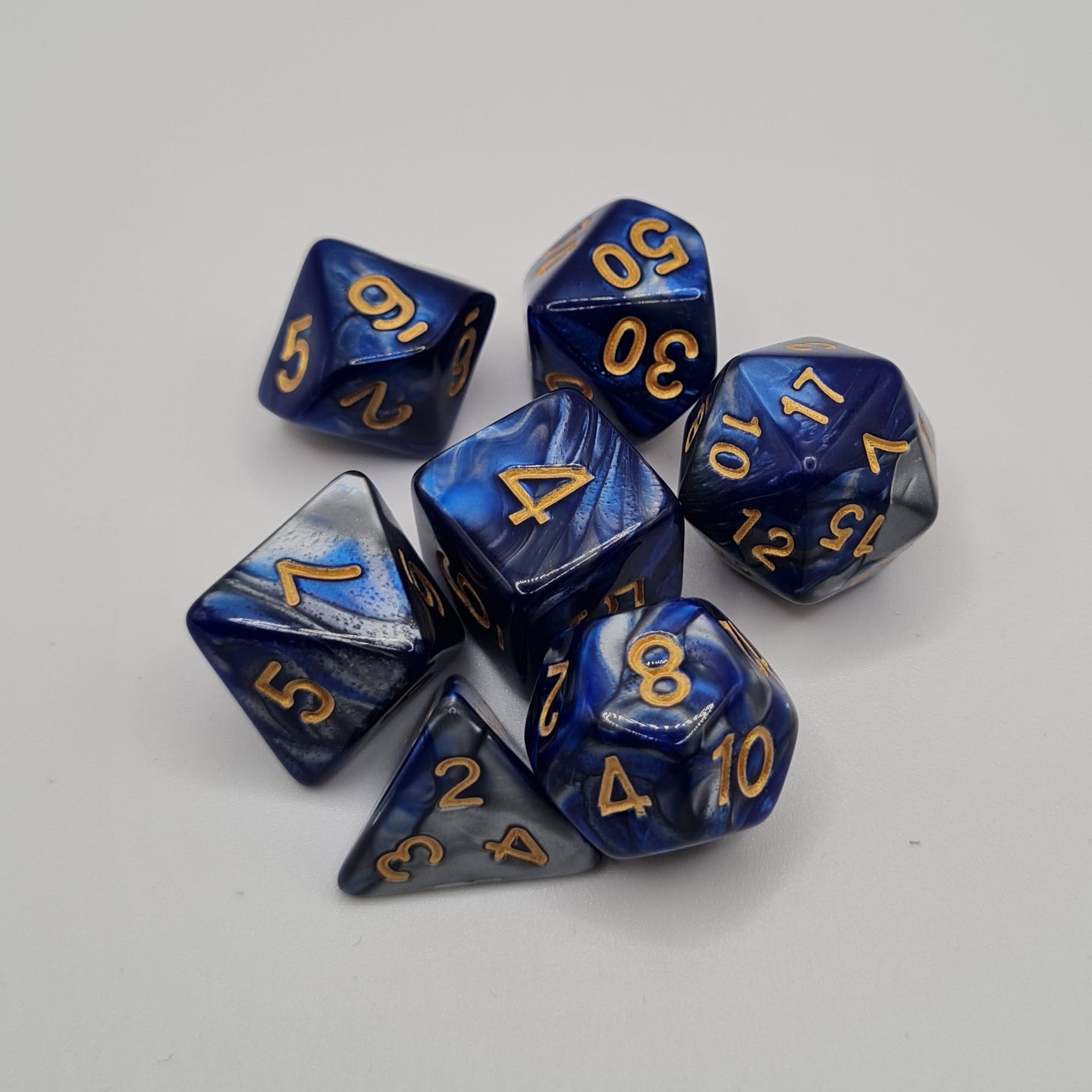 Blue and Silver Swirls Polyhedral Dice Set – 7-Piece Tabletop Gaming Dice with Bag