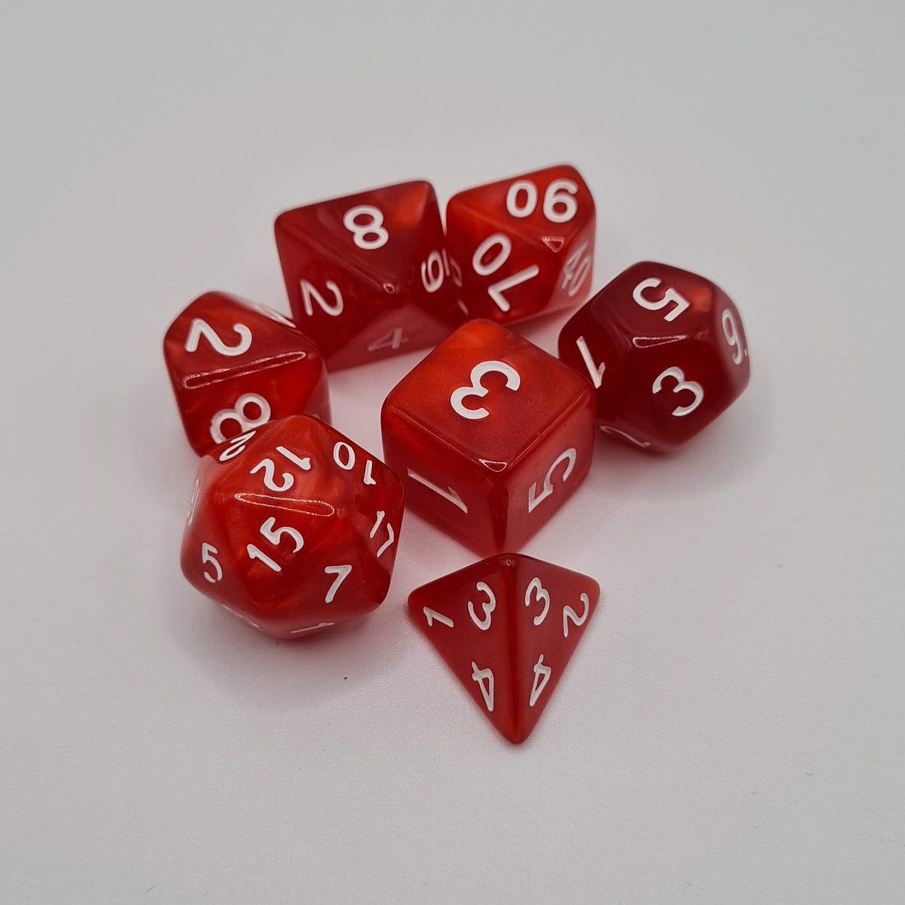Red Swirl White Numbers Polyhedral Dice Set – 7-Piece Tabletop Gaming Dice with Bag
