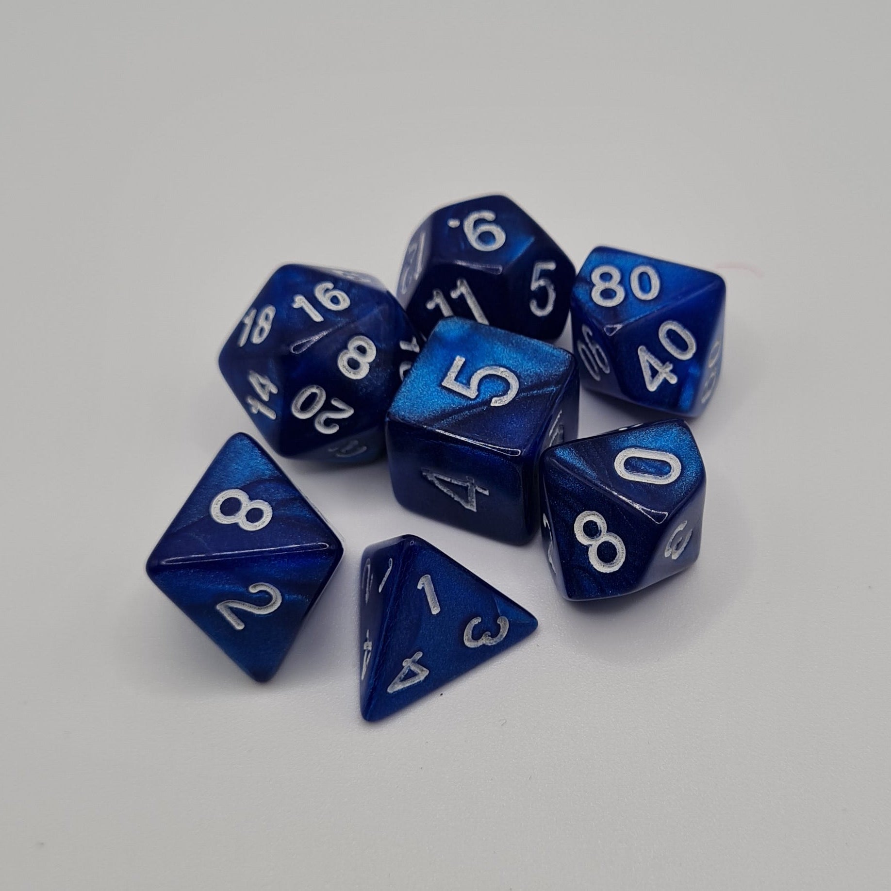 Blue Swirl White Numbers Polyhedral Dice Set – 7-Piece Tabletop Gaming Dice with Bag